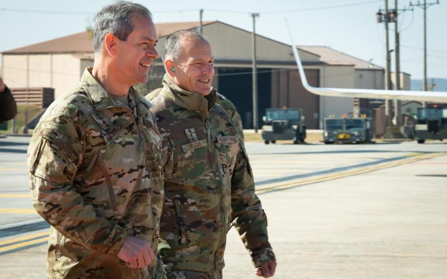 Gen. Ken Wilsbach, Pacific Air Forces commander, and Lt. Gen. Scott Pleus, 7th AF commander, converse before a flight at Osan Air Base, Republic of Korea, Nov. 4, 2022. As PACAF commander, Wilsbach oversees Air Force activities spread over half the globe in a command that supports more than 46,000 Airmen serving principally in Japan, South Korea, Hawaii, Alaska and Guam. (U.S. Air Force photo by Senior Airman Megan Estrada)