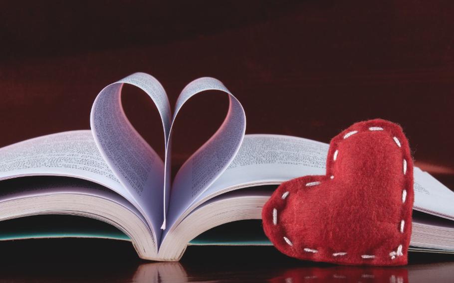 Valentine's day background with open book and heart-shaped pages