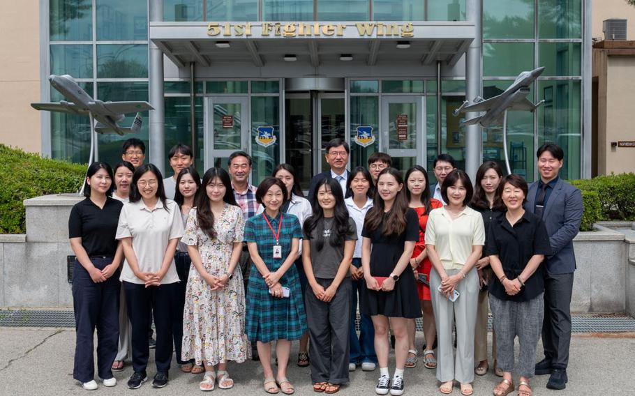 Members from the Pyeongtaek International Exchange Foundation take a group photo after receiving a base tour at Osan Air Base, Republic of Korea, Aug. 6, 2024. Established by Pyeongtaek City in 2014, PIEF has been a partner in enhancing community outreach and supporting events with Osan AB. This collaboration has been crucial in building strong relationships between the local community and the members of the base.