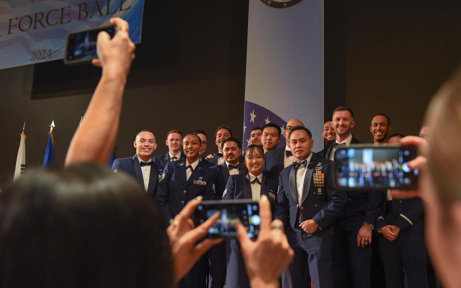 7th Air Force’s Peninsula Wide AF Ball attendees pose for photos at the Grand Walkerhill Hotel in Seoul, Republic of Korea, Oct. 4, 2024.