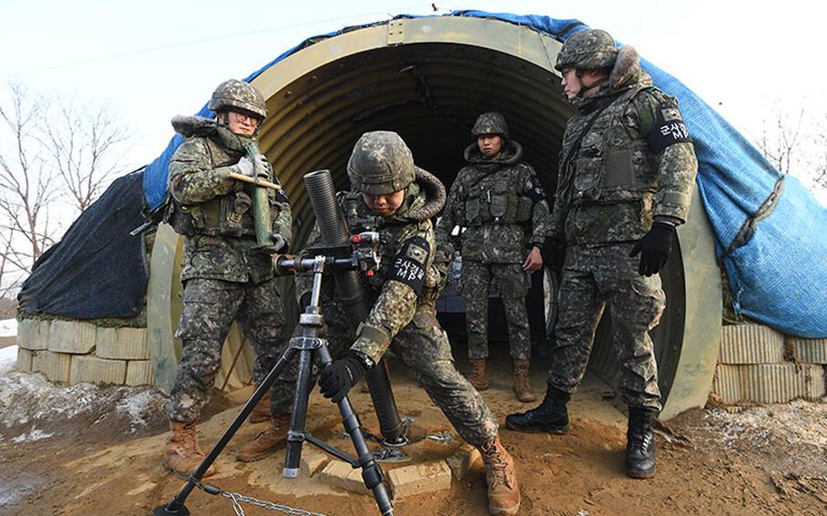 Soldiers from the artillery company are conducting non-firing training with 81mm mortars.