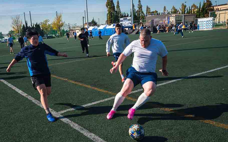 Members from the U.S. Air Force 8th Fighter Wing and the Republic of Korea Air Force 38th Fighter Group play soccer during Friendship Day at Kunsan Air Base, R.O.K, Nov. 7, 2024.