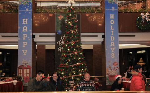 Photo Of U.S. Soldiers, civilians, distinguished guests, and family members gather to celebrate the holiday season during an annual tree lighting ceremony at the Dragon Hill Lodge, Yongsan, South Korea, Dec. 17, 2024.