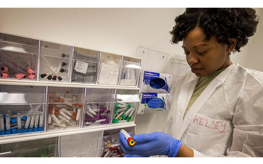 Air Force Senior Airman Kristen N. Kelsey, a medical laboratory technician with the 514th Aeromedical Evacuation Squadron, Air Force Reserve Command, labels blood samples at Joint Base McGuire-Dix-Lakehurst, New Jersey. (U.S. Air Force photo by Master Sgt. Mark Olsen)