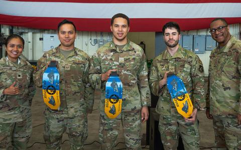 Photo Of From left, Lt. Col. Rarawee Euavijitearoon, 8th Maintenance Squadron commander stands with Airman 1st Class Jack Sheldon, 35th Fighter Generation Squadron crew chief, Airman Amari Crowley, 35th FGS crew chief, Staff Sgt. Miguel Guajardo, 35th FGS crew chief and Chief Master Sgt. Frederick Littles, 8th Maintenance Group wing weapons leader, after awarding the 1st quarter load crew competition trophies to members of the 35th FGS at Kunsan Air Base, Republic of Korea, April 3, 2024.
