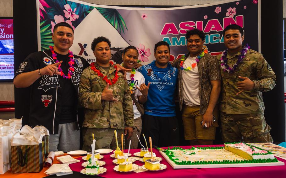 Airmen pose for a photo during the Asian American and Pacific Islander Heritage Month kickoff at Kunsan Air Base, Republic of Korea, May 3, 2024.