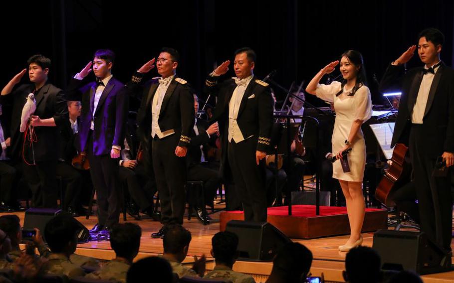 Members of the Korean National Military Symphony Orchestra present a salute to the audiences.