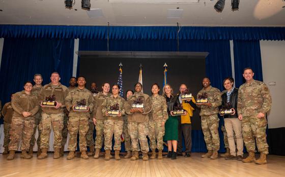 The 51st Fighter Wing 4th Quarter Award winners pose for a group photo at Osan Air Base, Republic of Korea, Jan. 16, 2025. The awards ceremony recognizes outstanding performers throughout the wing supporting the “Fight Tonight” mission.