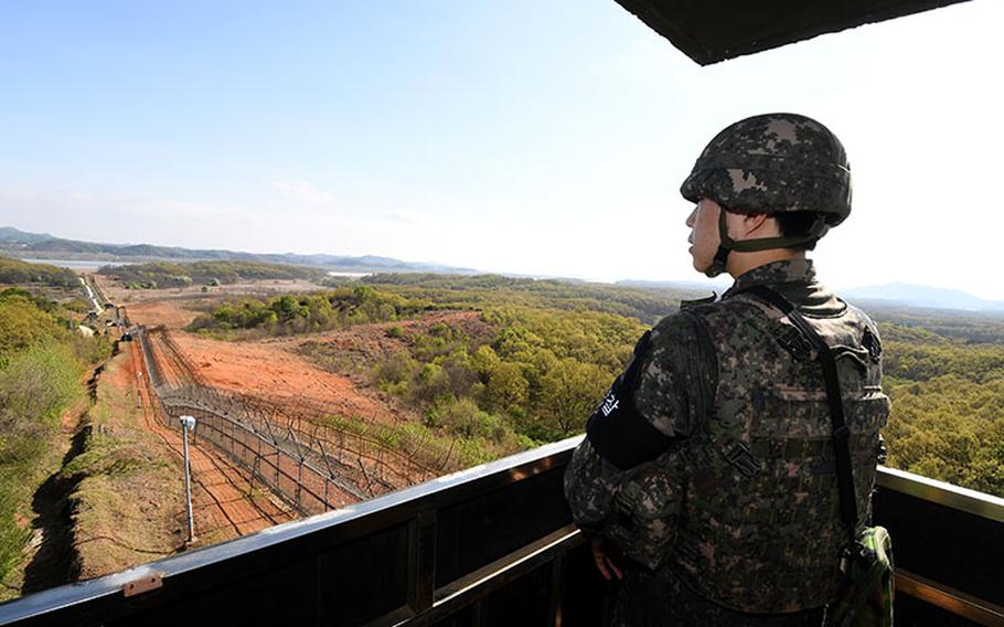 A soldier is guarding the front from a post on the southern limit line.