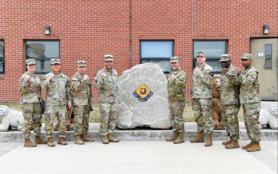 Leaders of the U.S. Army 20th Chemical, Biological, Radiological, Nuclear, Explosives (CBRNE) Command pose together with leaders from the 23rd Chemical, Biological, Radiological, Nuclear (CBRN) Battalion on Camp Humphreys, South Korea, March 11. American Soldiers and Army civilians from the 20th CBRNE Command trained with Eighth Army and Combined Forces Command units during the exercise, with some of their personnel in South Korea while others supported remotely from Aberdeen Proving Ground, Maryland.