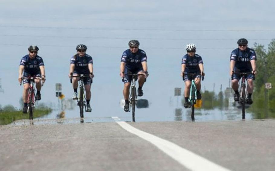 Members of the Air Force Cycling Team ride near Minot Air Force Base, North Dakota in 2017. There are six Minot Air Force Base Airmen on the Air Force Cycling Team, which has more than 150 cyclists Air Force-wide. (Photo by Air Force Airman 1st Class Jonathan McElderry.)