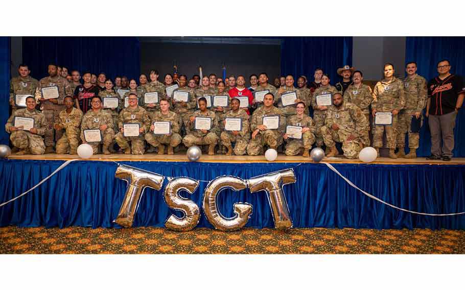 U.S. Air Force technical sergeant selects pose for a group photo at Osan Air Base, Republic of Korea, July 3, 2024.