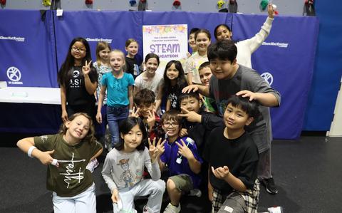 Photo Of Students gather for a group photo during a Science, Technology, Engineering, Arts and Mathematics (STEAM) event hosted by the U.S. Army Corps of Engineers – Far East District at Central Elementary School on Camp Humphreys, South Korea.
