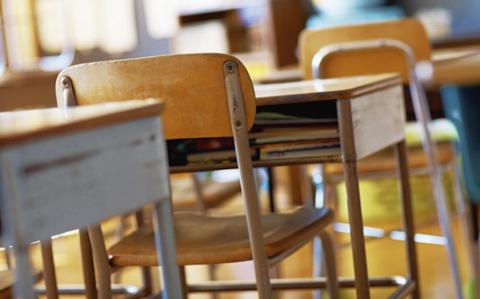 Photo Of desks and chars in classroom