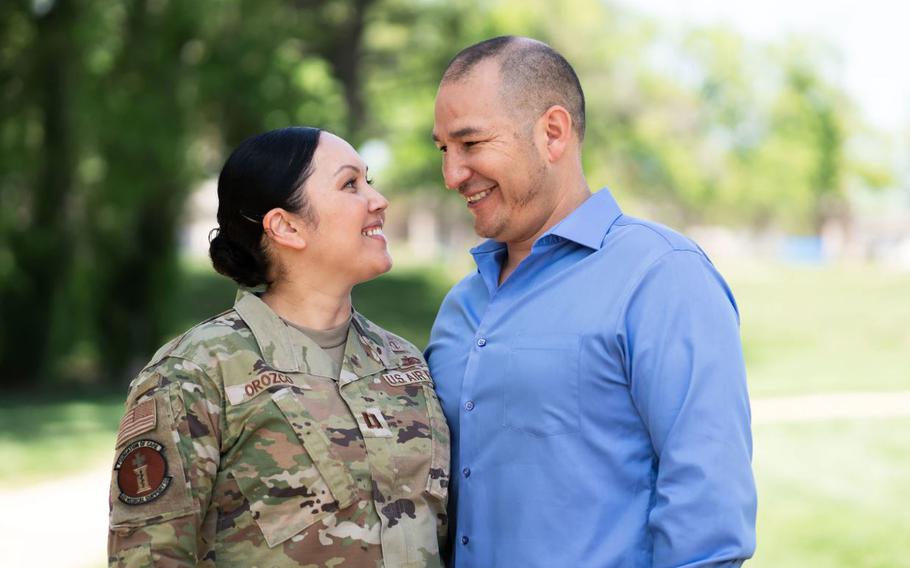 U.S. Air Force Capt. Jennifer Orozco, 60th Medical Operations Squadron clinical social worker and her spouse, Josue, participate in the Military Spouse Appreciation Day campaign at Travis Air Force Base, California, April 7, 2022. May 6th is Military Spouse Appreciation Day and Travis AFB is celebrating by highlighting the resiliency and commitment of spouses in the military community. (U.S. Air Force photo by Chustine Minoda)