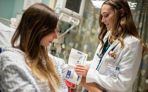 Photo Of a doctor checking on a patient
