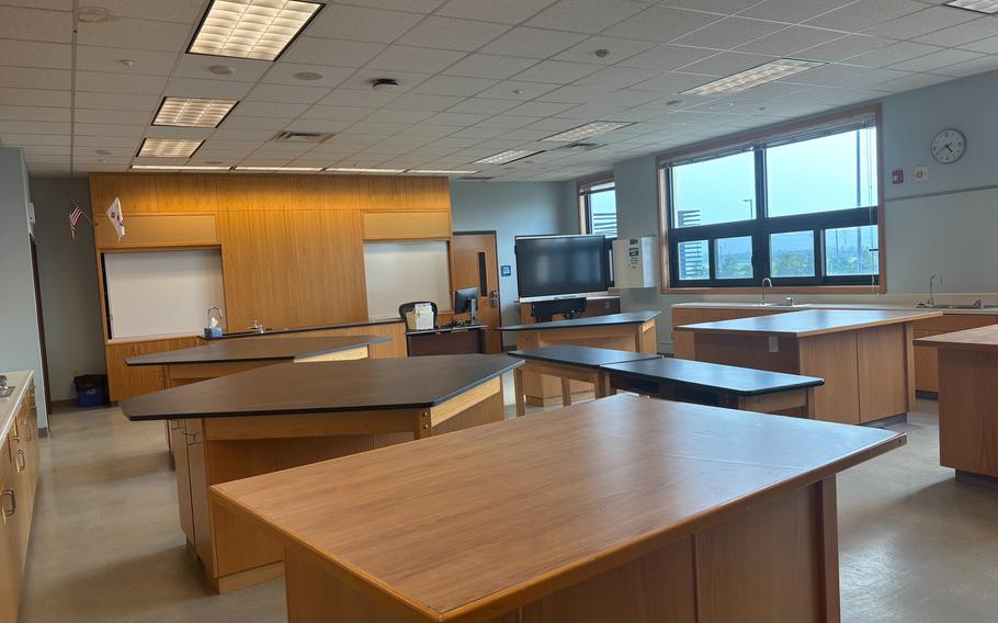 There are some desks in the new science lab.