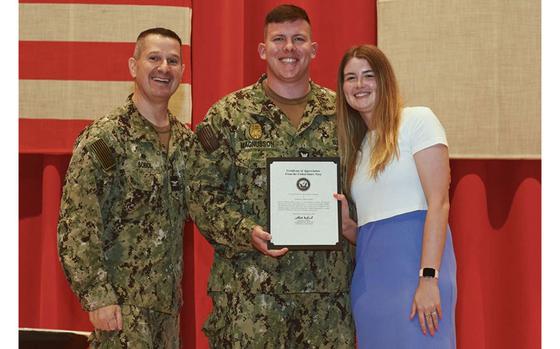 Master-at-Arms 1st Class Logan Magnusson of Commander, Fleet Activities Yokosuka re-enlists June 21, 2024.