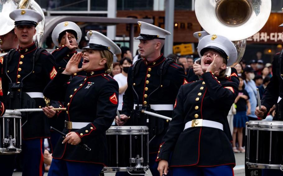 U.S. Marine Corps LCpl. Madison Hart, left, and Cpl. Paige Brokopp, both musicians with the III Marine Expeditionary Force Band, perform in a parade during the 2024 Pohang International Fire and Light Festival at Pohang Young-il-dae Beach, South Korea, June 1, 2024. The festival is held annually and provides attendees the opportunity to learn and experience the South Korean culture. The III MEF Band performed during the festival to enhance relationships with Pohang citizens. Hart is a native of Georgia and Brokopp is a native of Florida.