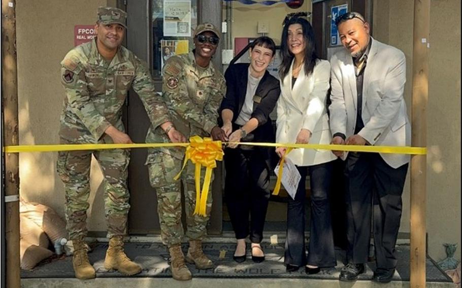 Col. Joshua Hawkins, Maj. Jamila Edgerson, Hayley Yamanaka, Sanghee Park, and Patrick Schoolfield commemorate the grand opening of the ERAU Kunsan Campus.