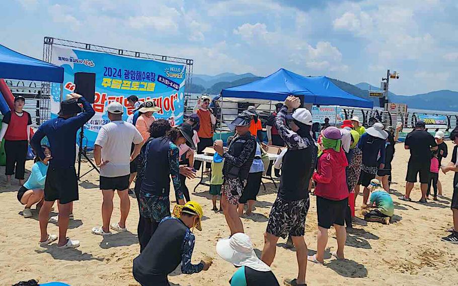 people enjoying on the beach.