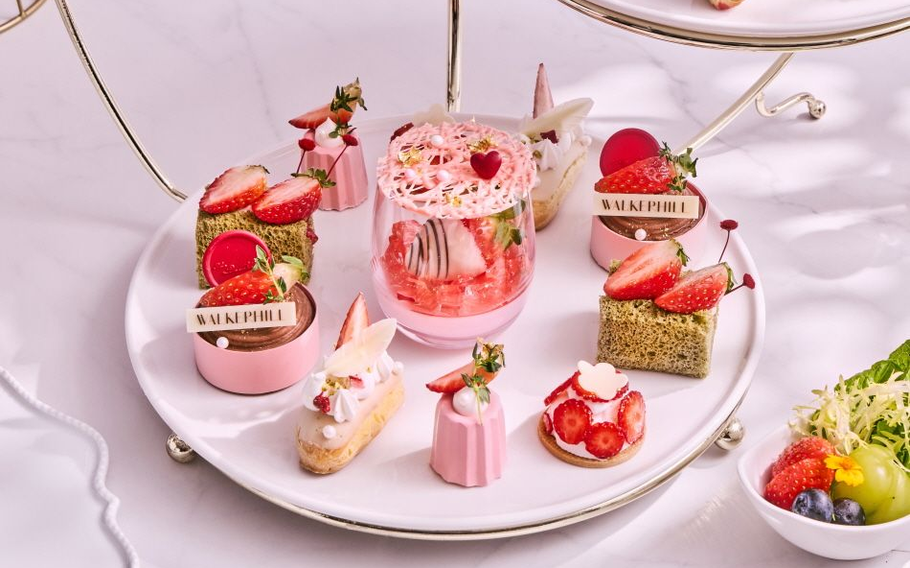 strawberry dishes and sweets on the table.