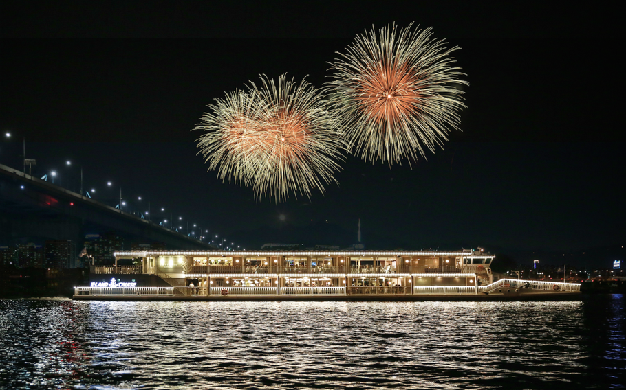 fireworks can be seen above a cruise.