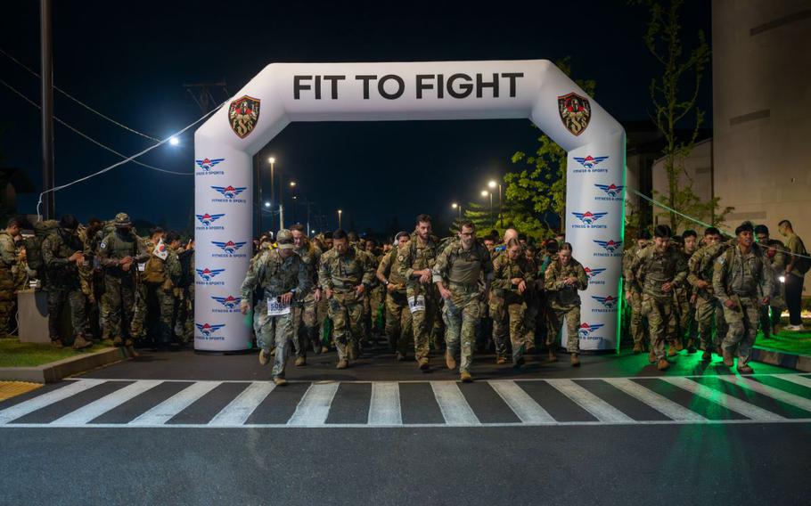 Participants begin the Four Chaplain Memorial Run and Ruck at Osan Air Base, Republic of Korea, May 17, 2025. The event featured the Norwegian Foot March, a long-standing military event that challenges participants to march 18.6 miles while carrying a minimum of 25 pounds, completing the ruck within the time set for their age group. 
