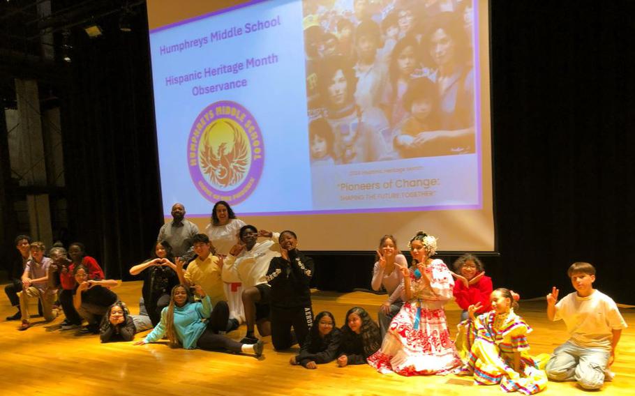 Students that participated in the Humphreys Middle School Hispanic Heritage Month Program with Humphreys Middle School Assistant Principal Ms. Natalya Cho and Administrative Officer Mr. Michael Robinson.  