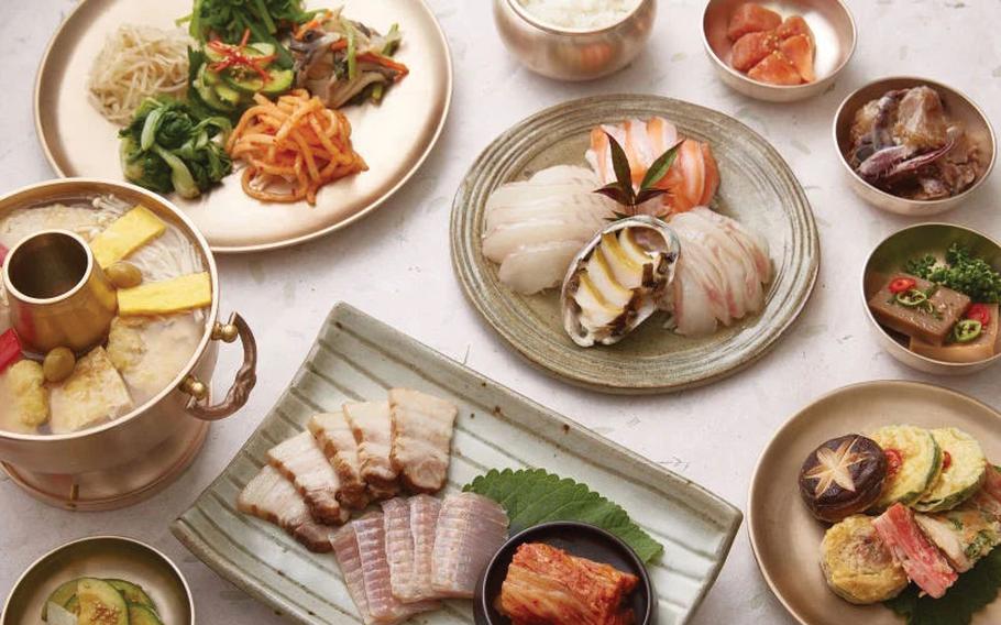 Many dishes are on the table.