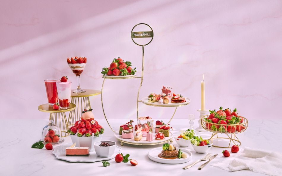 strawberry dishes and sweets on the table.