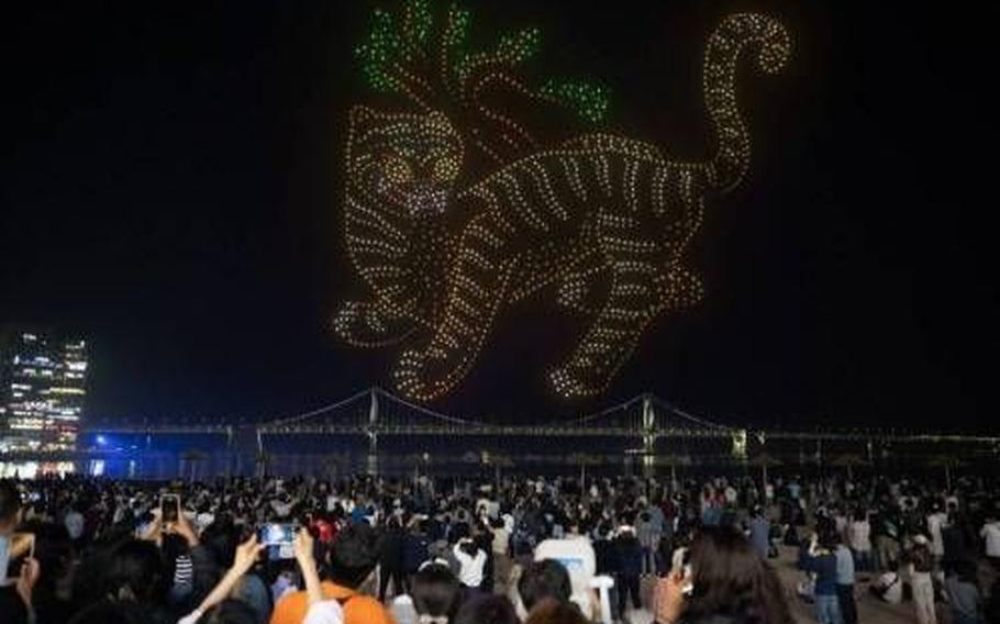 Visitors enjoy the show.