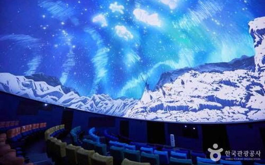 planetarium’s screen and seats.