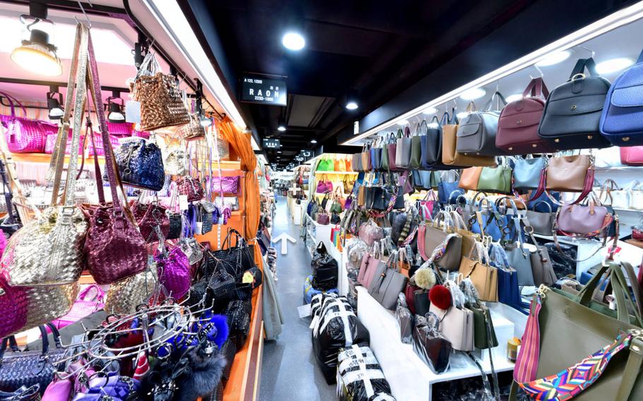 an abundance of bags are sold at the market.