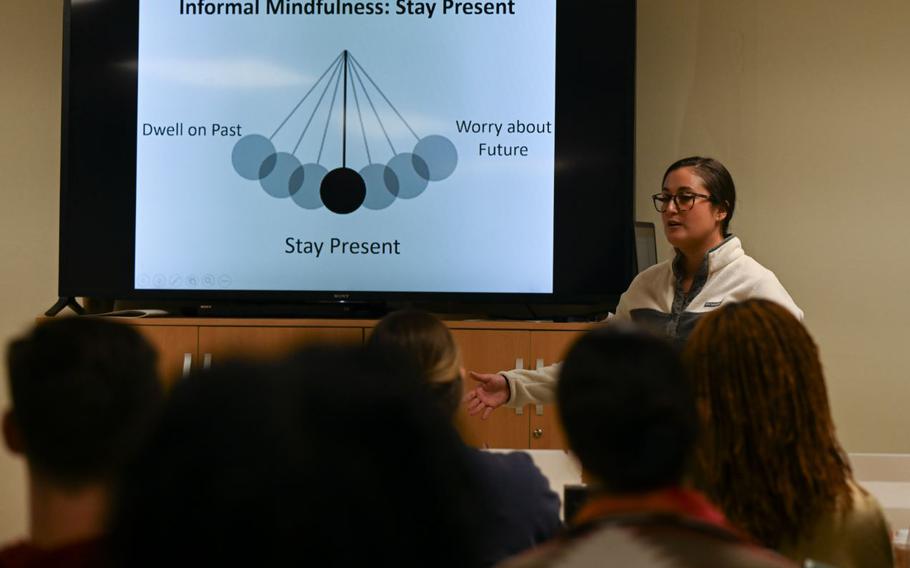 Tech. Sgt. Katlin Ayres teaches a resiliency lesson on mindfulness, using screen.