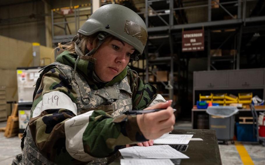 U.S. Air Force Tech. Sgt. Victoria Wells, 51st Force Support Squadron postal service center non-commissioned officer in charge, takes inventory of weapons during Beverly Herd 24-1 at Osan Air Base, Republic of Korea, May 13, 2024. Routine training like Beverly Herd are pivotal platforms for 51st Fighter Wing Airmen to refine their warfighting proficiencies through application, concurrently enhancing their ability to respond skillfully to contingencies. 