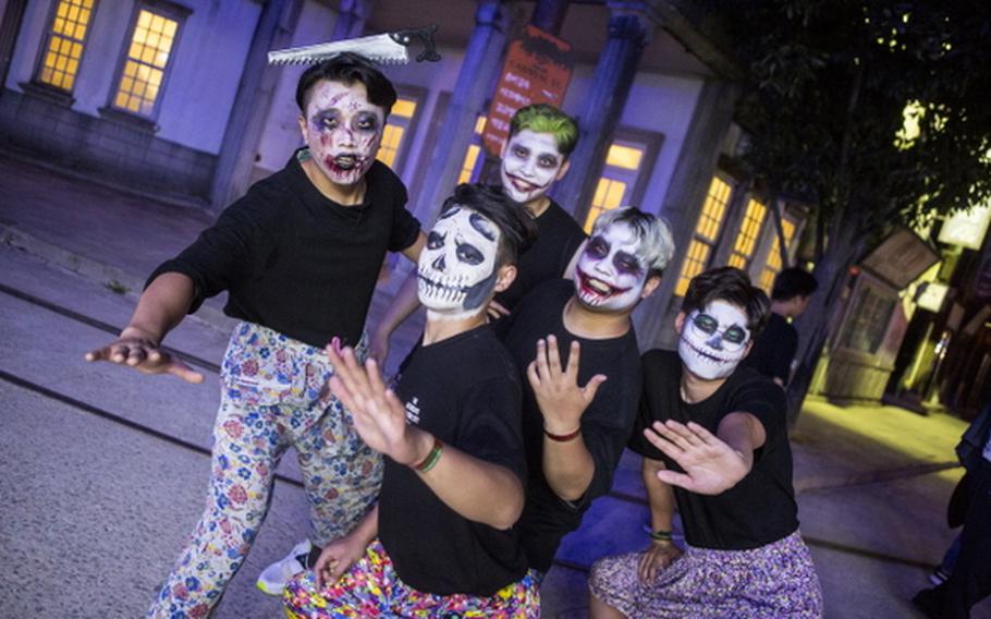 Staff members pose for a photo at Ghost Park.