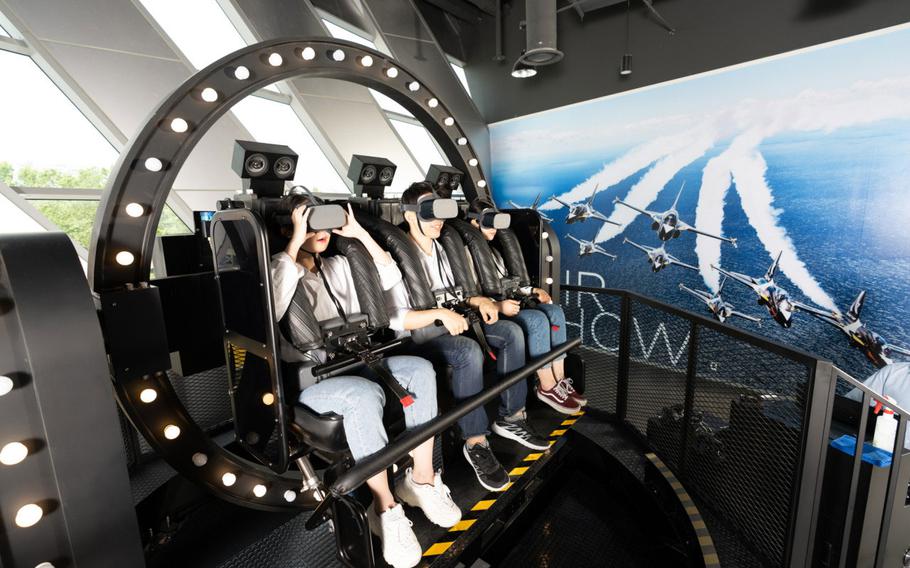 A machine that allows visitors to experience piloting a plane virtually.