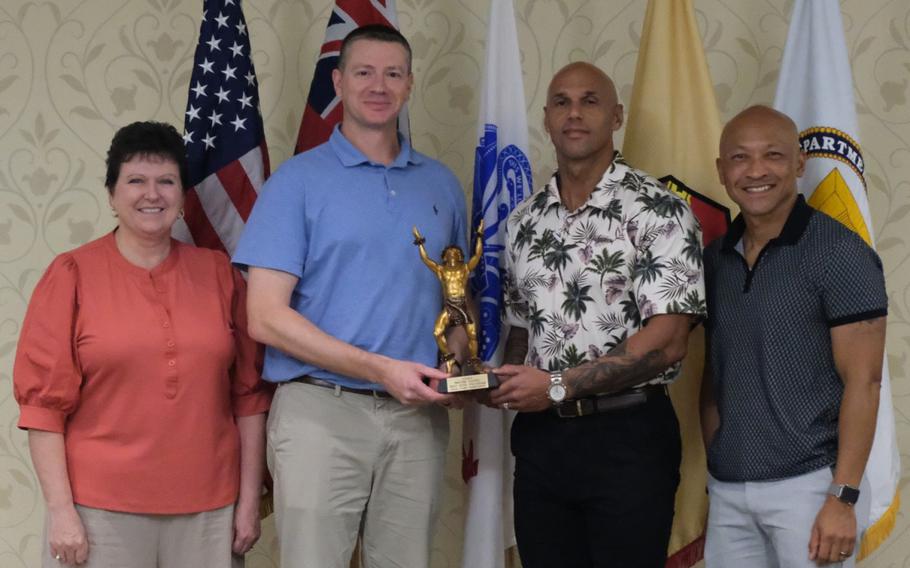 USAG Humphreys Commander, Col. Ryan K. Workman and Command Sgt. Maj. Monty C. Drummond accepted the 2024 IMCOM-Pacific Best BOSS Program trophy on behalf of the BOSS team.