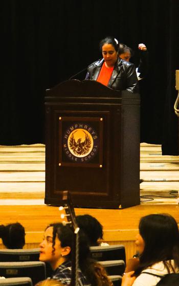 Humphreys Middle School Assistant Principal Natalya Cho presenting opening remarks to students, staff, and special guest attending the annual violence prevention month observance at Humphreys Middle School.