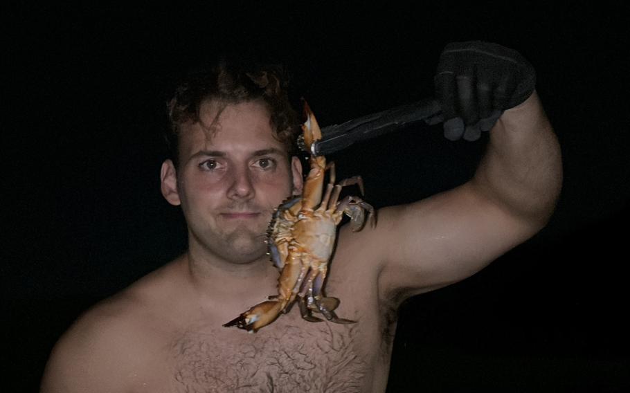 Ryan caught blue crabs with tongs.