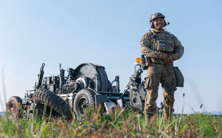 U.S. Air Force Staff Sgt. Julyon Moton, 51st Civil Engineer Squadron barrier maintenance non-commissioned officer in charge, prepares for a F-16 Fighting Falcon to utilize an alternate landing strip during Vigilant Defense 24 at Osan Air Base, Republic of Korea, Oct. 29, 2023. In contingency environments, the ALS is activated when the main runway sustains heavy damage, which allows pilots to maintain readiness and continue flying operations. VD24 is a routine training event that tests the military capabilities across the peninsula, allowing combined and joint training at both the operational and tactical levels.
