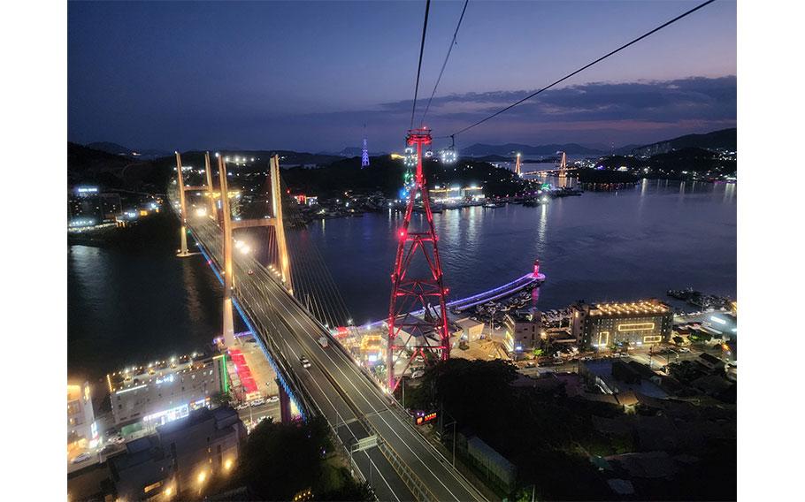The Yeosu Maritime Cable Car ride offers a breathtaking nighttime view of the city’s coastal beauty.