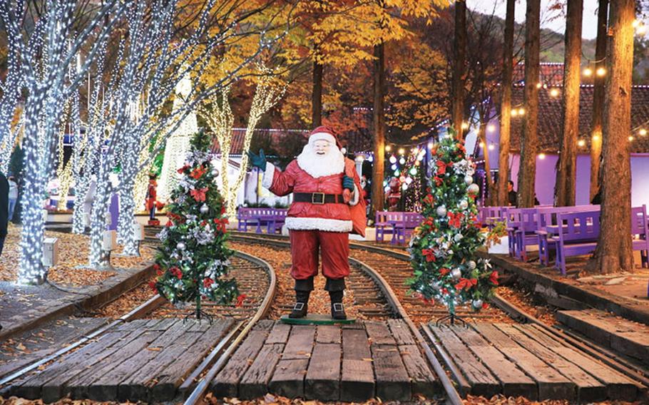 Santa Clause on a railroad crossing.