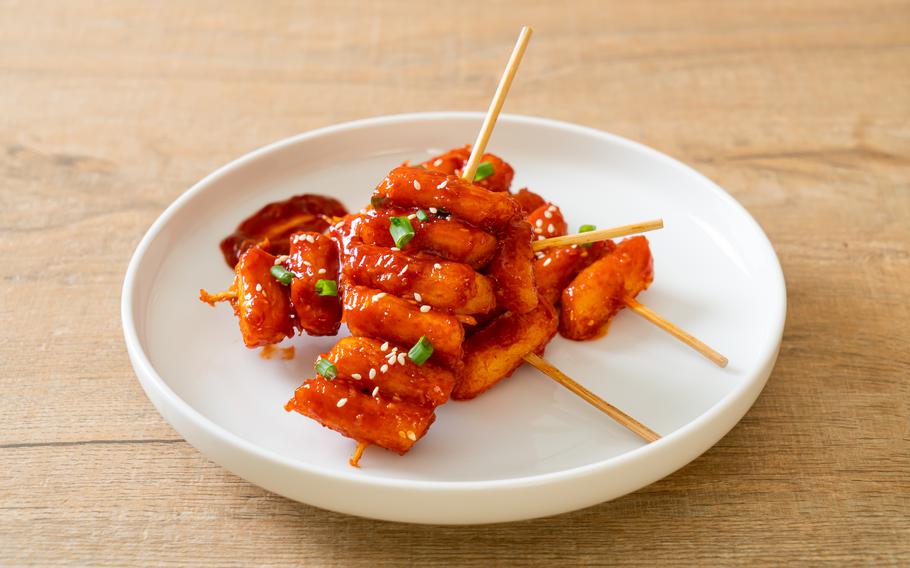 deep fried Korean rice cake (Tteokbokki) skewered with spicy sauce - Korean food style