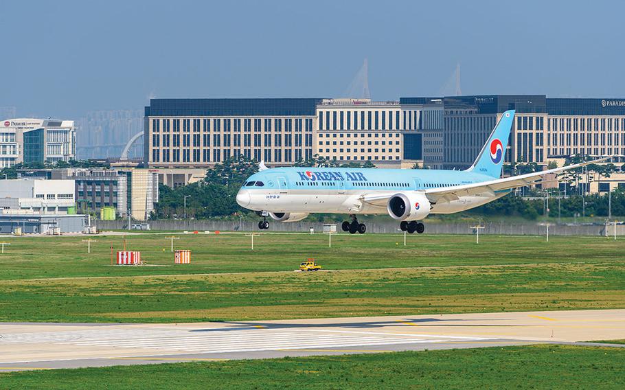 A Korean Air plane is about to land.