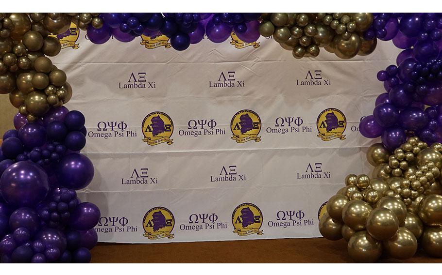 stage decorated with balloons.