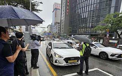 Photo Of A man is shooting a taxi.