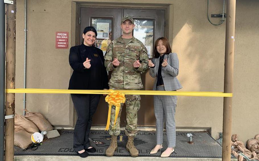 Rae Clark, Joshua Carlson, and Yee Chang support the educational goals and student experience at Kunsan AB. 