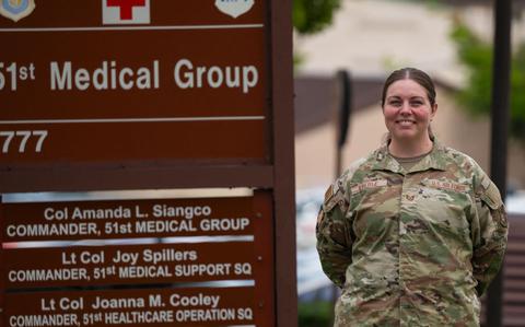 Photo Of U.S. Air Force Tech. Sgt. Kylie Eberle poses for a photo at Osan Air Base.